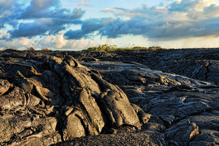 Lava flow under pacific skiesの写真素材