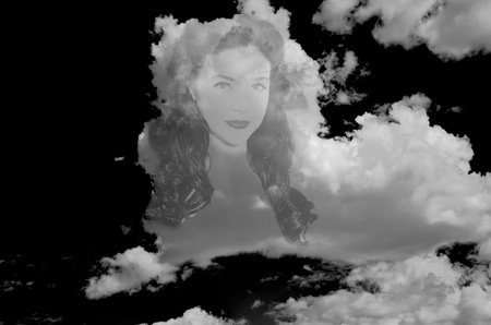 Ghost of a pretty girl in the cloudsの写真素材