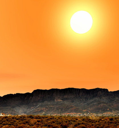 Sunrise at Desert City beneath cliffs Arizonaの写真素材