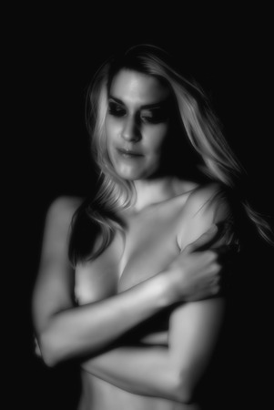 Soft focus infrared black and white sensual beautiful woman with perfect body posing nudeの写真素材