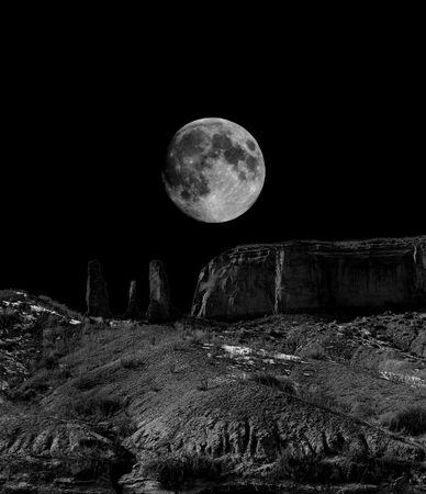 Infrared monochrome desert moon over the southwestern USA Sonora desert Arizona and mountainsの写真素材