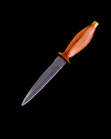 Edged weapon dirk isolated over a black backgroundの写真素材