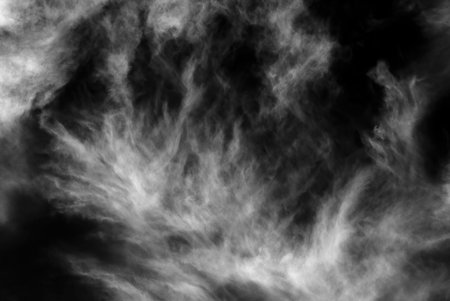 Clouds in a dark sky photographed in Infrared
