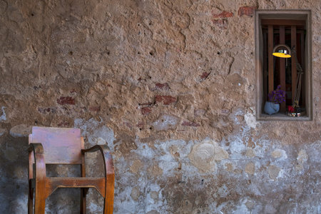 vintage wooden chair at the old room with lamp.の写真素材