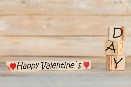 wooden blocks with the phrase happy valentine's day,の写真素材