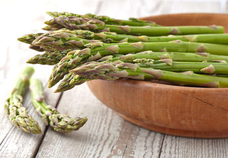 Asparagus in a wooden backgroundの写真素材