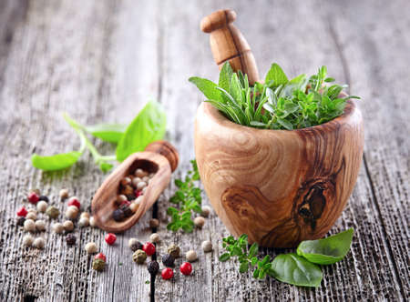 Spices on a wooden boardの写真素材