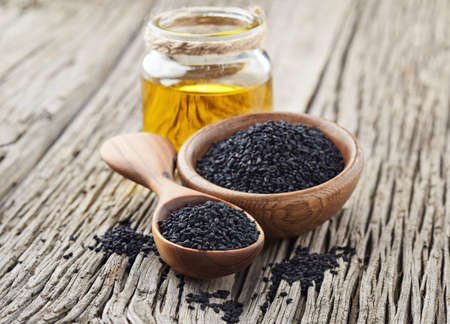 Black cumin oil with seedsの写真素材
