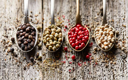 Peppers on wooden boardの写真素材