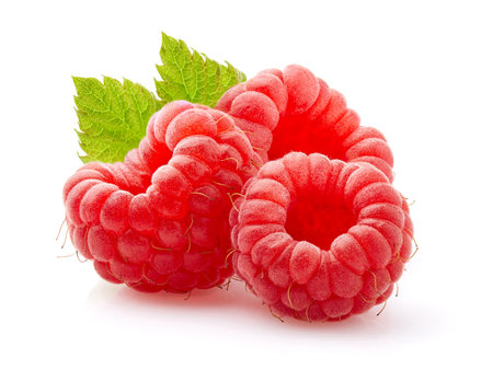 Raspberry in closeup isolated on white