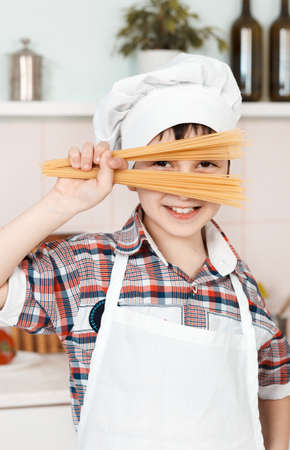 Portrait of a little chef hat and apronの写真素材