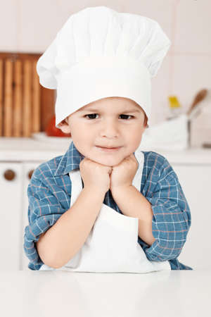 Portrait of a little chef hat and apronの写真素材