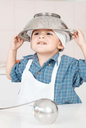 Portrait of a little chef hat and apronの写真素材