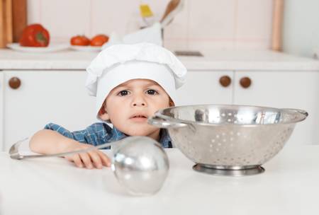 Portrait of a little chef hat and apronの写真素材