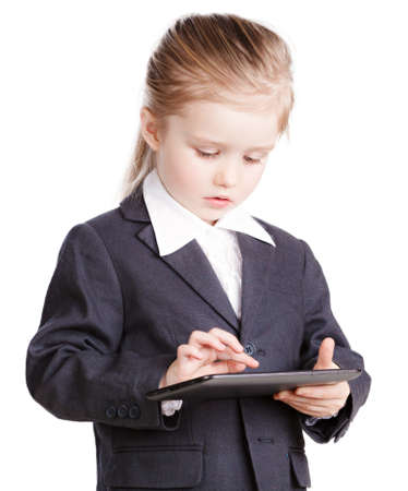 Little business girl with a tabletの写真素材