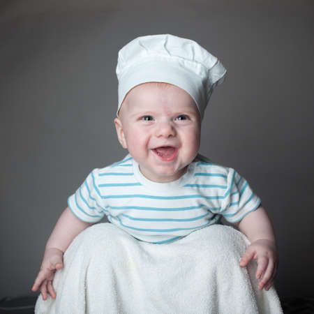 ittle boy in a chef hatの写真素材