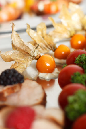 physalis deko on silver plateの写真素材