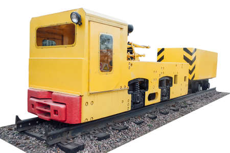 Mine car at the entrance of a former gold mine  isolated on whiteの写真素材
