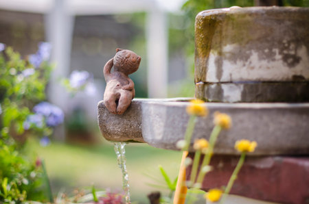 Clay cat in the gardenの写真素材