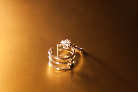Focused old designed silver rings on a white backgroundの写真素材