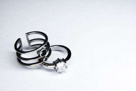 Focused old designed silver rings on a white backgroundの写真素材