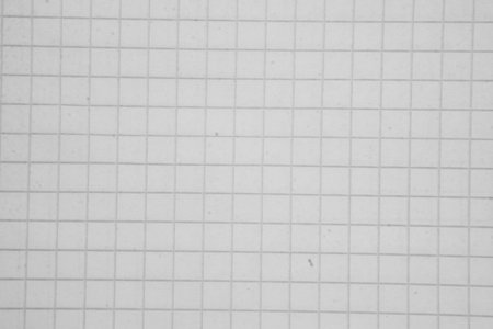 a sheet of paper in a cage background macroの写真素材