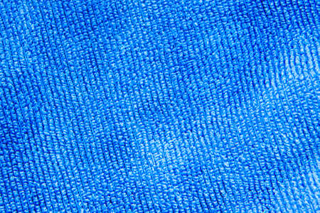 texture of a blue fabric background macro shotの写真素材
