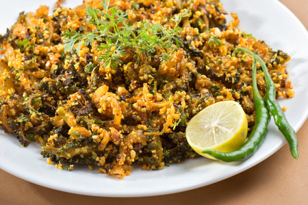 Indian Dish: Bitter gourd fry with spices and herbs