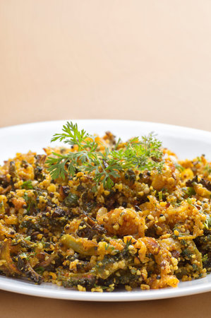 Indian Dish: Bitter gourd fry with spices and herbs