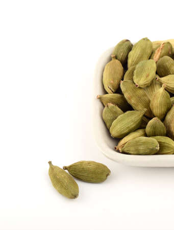 Green Cardamom pods in plateの写真素材