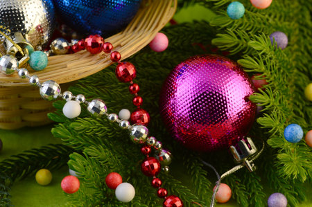 Christmas Decoration: Christmas ball and ornaments with the branch of Christmas tree