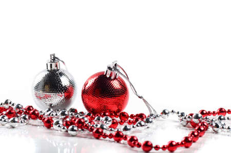 Christmas balls with ornaments on white background.の写真素材