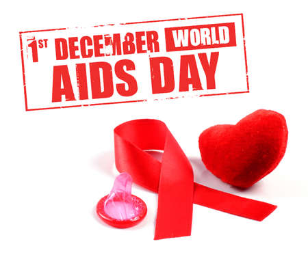 Aids ribbon, condom and heart on white background.の写真素材