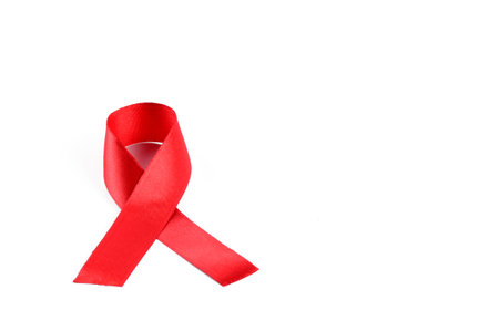 Aids Awareness Red Ribbon on white background.