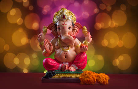 Hindu God Ganesha on Blured bokeh background, Ganesha Idol.の写真素材