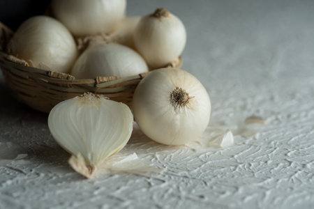Onions on textured background. Food Ingredients.