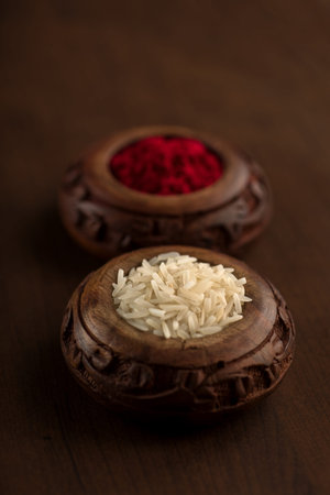Kumkum and rice grain container. Natural color powders are used while worshipping God and an at auspicious occasions.の写真素材