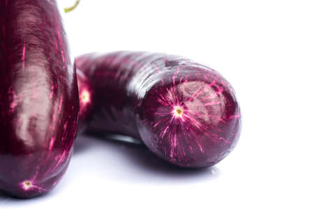 Eggplant or aubergine or brinjal vegetable isolated on a white background.の写真素材