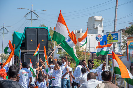 AMRAVATI, MAHARASHTRA, INDIA, JANUARY - 26, 2018: Unidentified people and student celebrating the Indian Republic Day by dancing with flags, drums.のeditorial素材