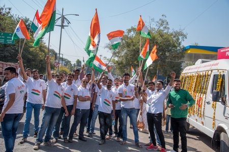 AMRAVATI, MAHARASHTRA, INDIA, JANUARY - 26, 2018: Unidentified people and student celebrating the Indian Republic Day by dancing with flags, drums.のeditorial素材