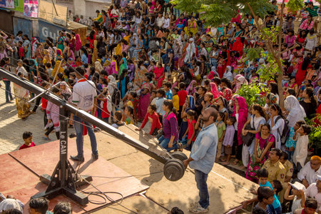AMRAVATI, MAHARASHTRA, INDIA - 8 SEPTEMBER 2018: Crowd of young People enjoying and dancing in the "Govinda" at Dahi Handi festival to celebrate God Krishna's Birth.のeditorial素材