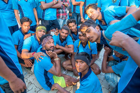 AMRAVATI, MAHARASHTRA, INDIA - 8 SEPTEMBER 2018: Crowd of young People enjoying and dancing in the "Govinda" at Dahi Handi festival to celebrate God Krishna's Birth.のeditorial素材