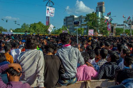 AMRAVATI, MAHARASHTRA, INDIA - 8 SEPTEMBER 2018: Crowd of young People enjoying and dancing in the "Govinda" at Dahi Handi festival to celebrate God Krishna's Birth.のeditorial素材