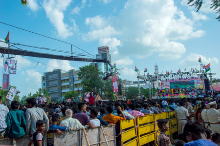 AMRAVATI, MAHARASHTRA, INDIA - 8 SEPTEMBER 2018: Crowd of young People enjoying and dancing in the "Govinda" at Dahi Handi festival to celebrate God Krishna's Birth.のeditorial素材