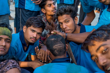 AMRAVATI, MAHARASHTRA, INDIA - 8 SEPTEMBER 2018: Crowd of young People enjoying and dancing in the "Govinda" at Dahi Handi festival to celebrate God Krishna's Birth.のeditorial素材