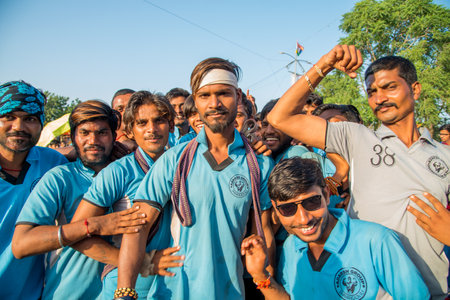AMRAVATI, MAHARASHTRA, INDIA - 8 SEPTEMBER 2018: Crowd of young People enjoying and dancing in the "Govinda" at Dahi Handi festival to celebrate God Krishna's Birth.のeditorial素材