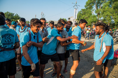 AMRAVATI, MAHARASHTRA, INDIA - 8 SEPTEMBER 2018: Crowd of young People enjoying and dancing in the "Govinda" at Dahi Handi festival to celebrate God Krishna's Birth.のeditorial素材