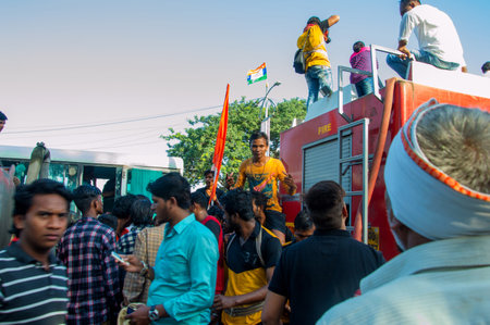 AMRAVATI, MAHARASHTRA, INDIA - 8 SEPTEMBER 2018: Crowd of young People enjoying and dancing in the...
