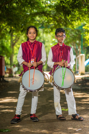AMRAVATI, MAHARASHTRA, INDIA - SEPTEMBER 24: Unidentified group of young people celebrating Festival...