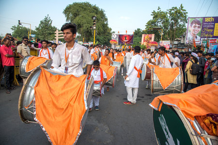 AMRAVATI, MAHARASHTRA, INDIA - 27 SEPTEMBER 2018: Unidentified faithful people carrying Hindu God Ganesha for immersion near water bodies during Ganesha festival. Annual festival.のeditorial素材
